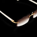 Cartier White Acetate Glasses With Gold C Decor & Brown Lens CT00560-002